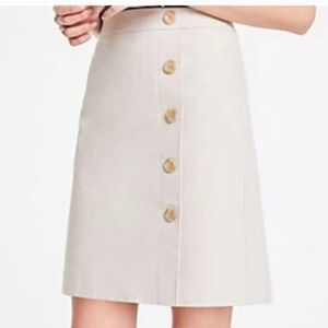 EUC Ann Taylor Size 00P A-Line Cream/Tan Lined Skirt Button Detail!